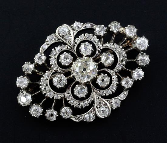 A Victorian gold, silver and diamond brooch, 1.5in.